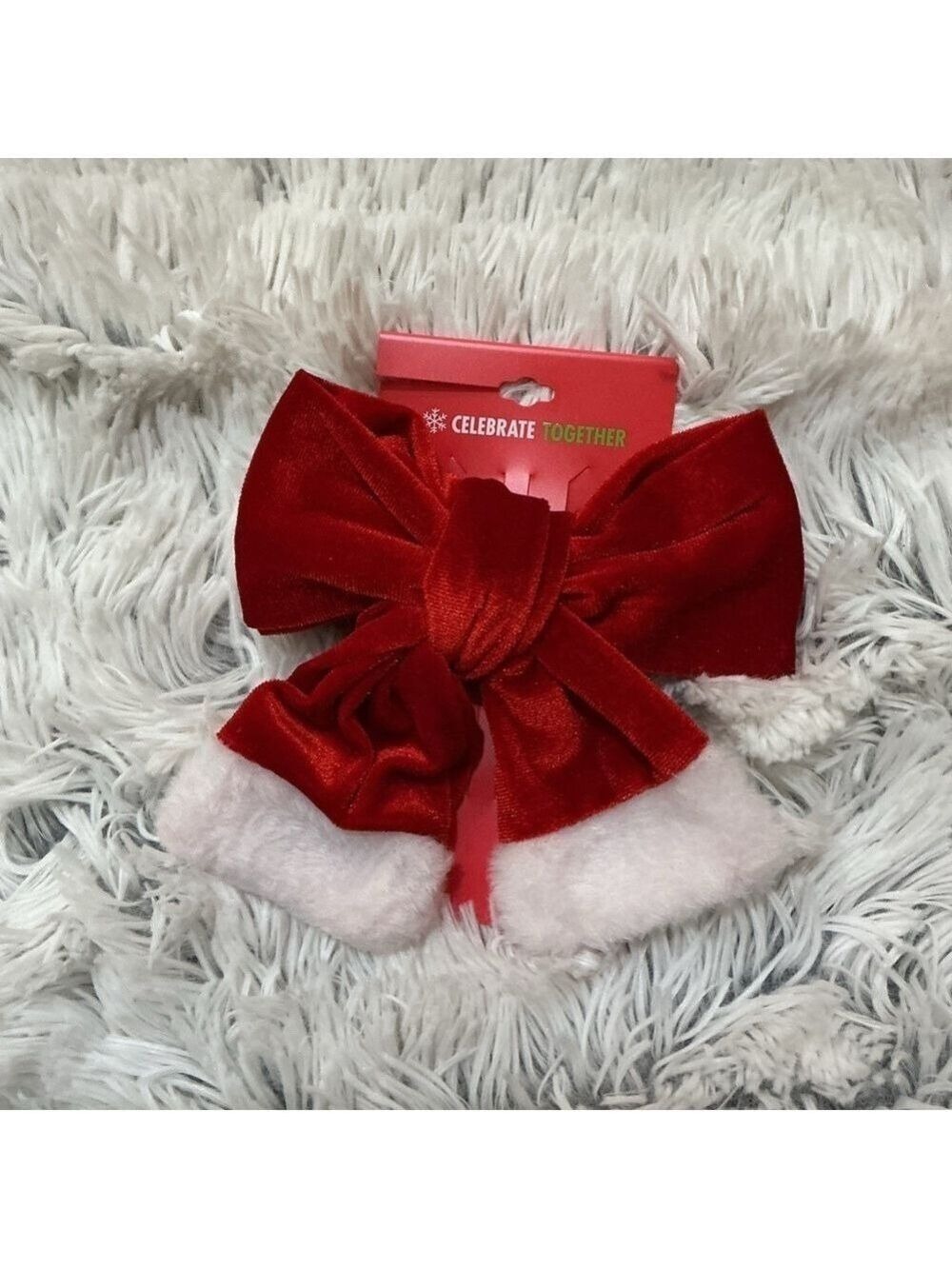 Celebrate Together oversized red velvet bow hair clip with white trim